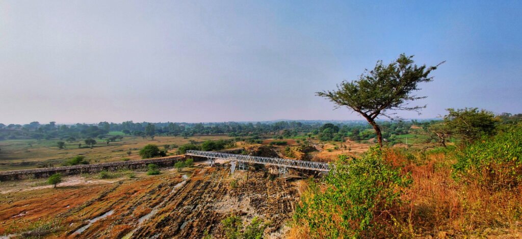 Bird's eye panoramic view of Kali dam, check dam on a sunny day in Dahod, Gujarat, India